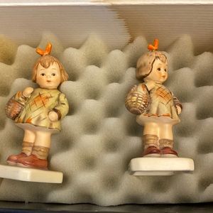 Set of two little girls. “I brought you a gift”